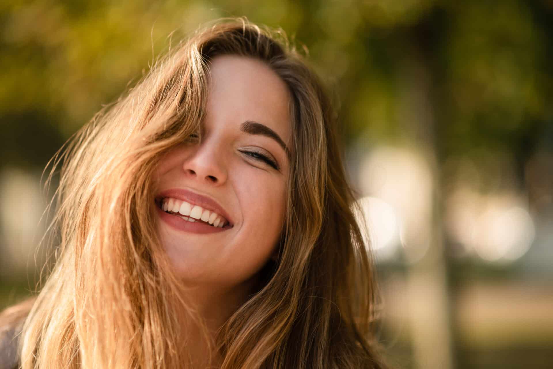 Smiling woman with perfect white teeth